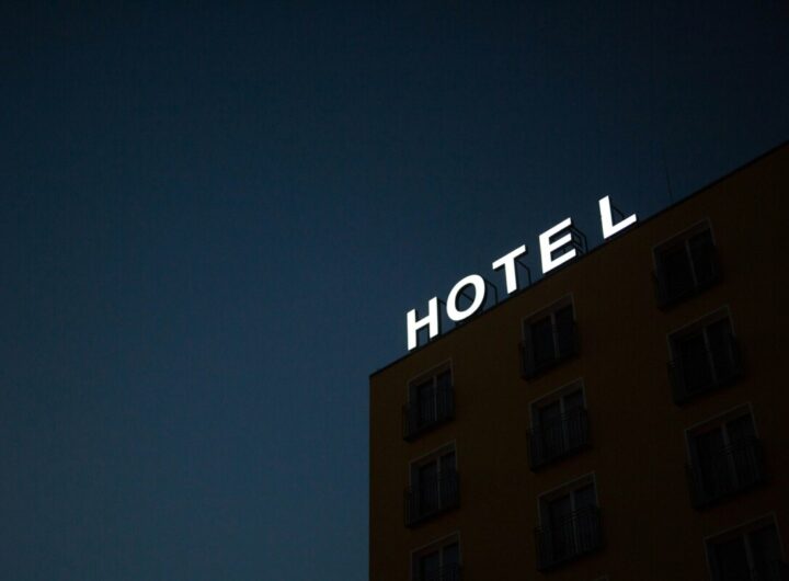 hotel sign at top of building